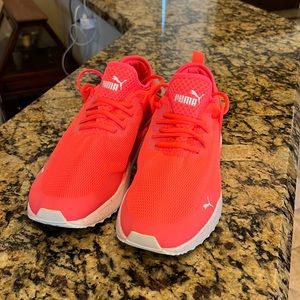 Size 9.5 puma running shoes.